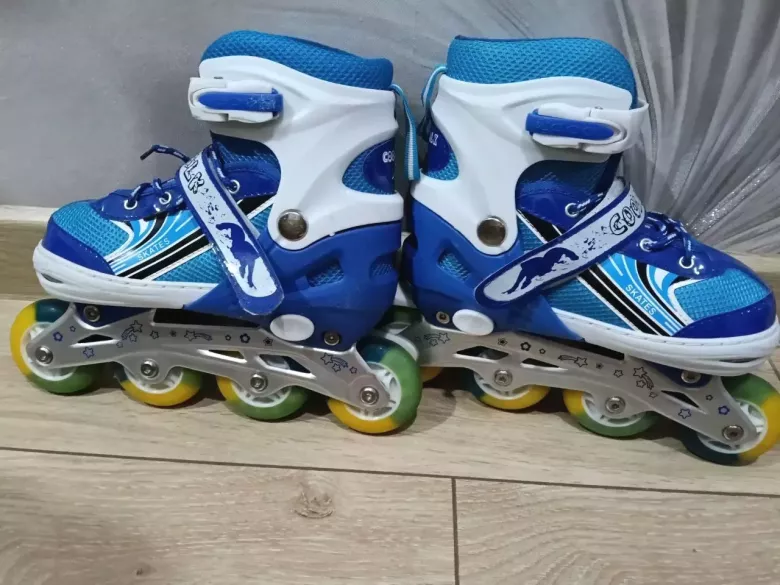 Роликовые коньки