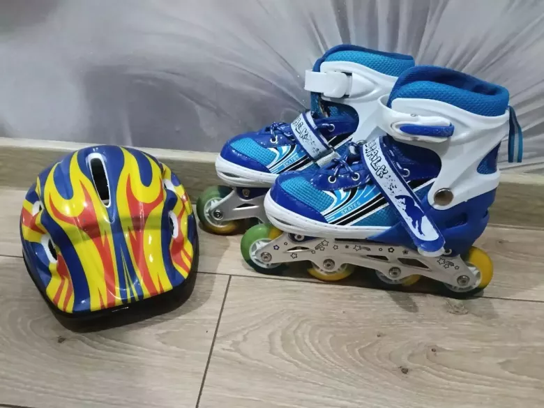 Роликовые коньки